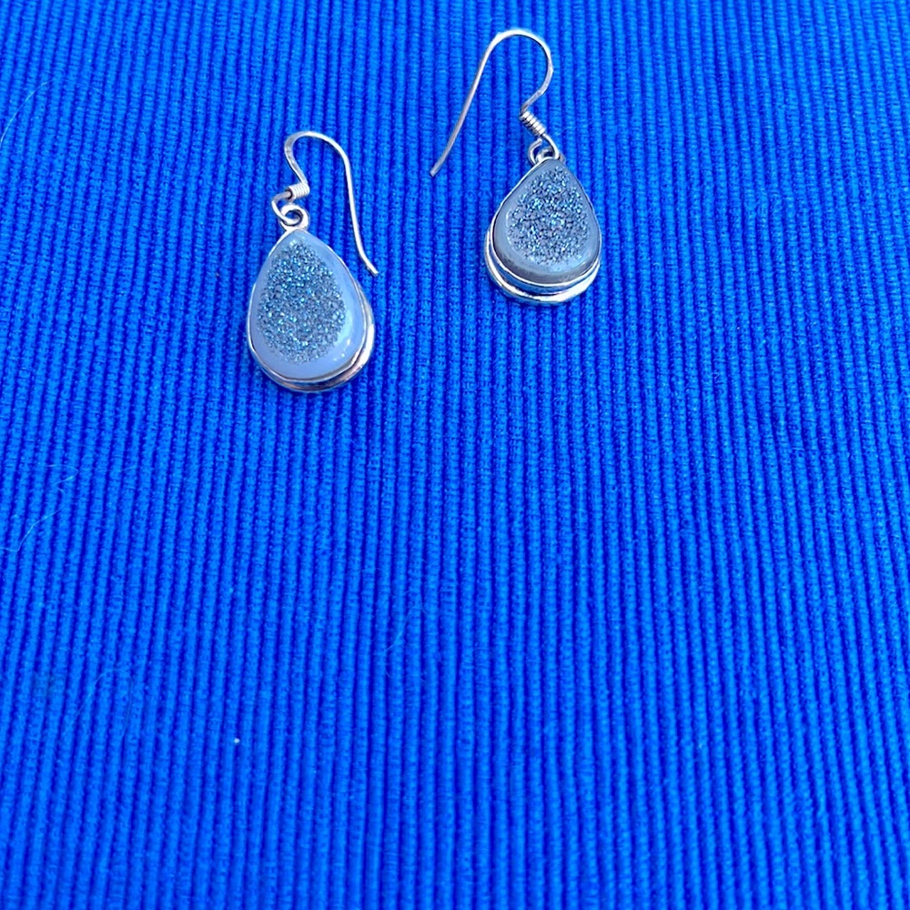 Blue and silver earrings.